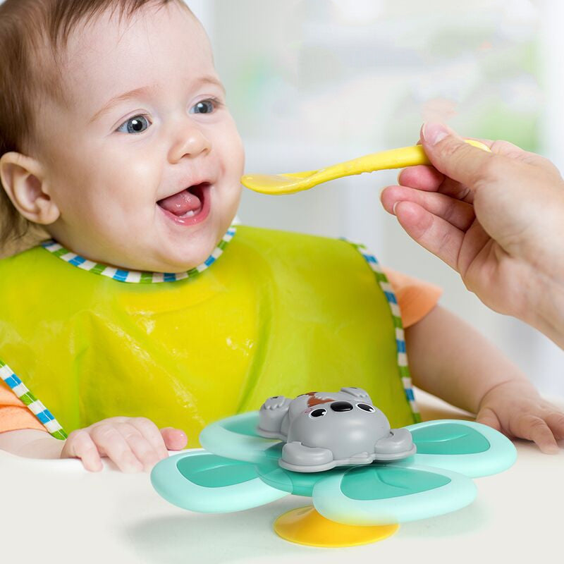 Spinning Baby Sucker Top Toy